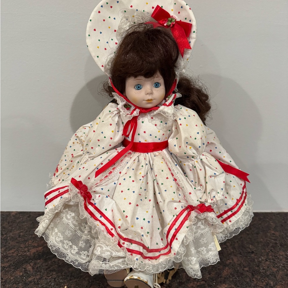 Polka Dot Porcelain Doll with Red Accents and chair